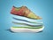 Pair of pink sport shoes by layers 3d render on color background