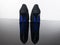 Pair of pointed woman shoes with black soles blue high heels