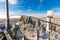 Pair of protective gloves of worker-climber is on the top of telecommunication tower with vertical panel antennas and