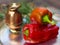 A pair of red capsicum annuum (bell peppers).