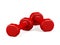 A pair of red light weight dumbbells on white background