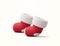 Pair of red and white cute baby socks with white trims. 3d rendered christmas socks icon isolated on background. 3d