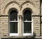 Pair Semi Circular Stone Arched Windows