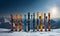 Pair of skis in snow with copy space. skis standing in snow with winter mountains in background. Winter holiday vacation