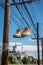 a pair of sneakers hanging on a power line