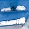 A pair of snow covered bee hives. Apiary in wintertime. Beehives covered with snow in wintertime. Beekeeping