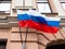 Pair of state Russian flags are fluttering in wind