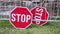 A pair of stop signs