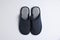 Pair of stylish slippers on light grey background, top view