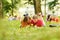 Pair successful students with a textbook in a Park