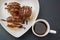 Pair of Tasty Pastries and Tea on Gray Table