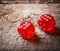 Pair of thrown red dices on wooden table