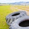 Pair of tires of a big tractor dismantled and left in a Italian