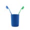 Pair of toothbrushes in blue plastic cup isolated over white background