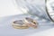 Pair of two tone gold wedding rings with wave design