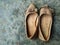 A pair of used cream colored women\\\'s shoes