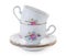 Pair of vintage czech empty porcelain cups for coffee on saucers, old style rich decorated, isolated on a white background