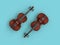 Pair of violins on a blue background