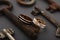 Pair of wedding enamel rings on gray background with vintage rusty keys