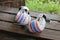 Pair of white boxing gloves paint thai flag