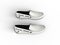 Pair of white loafers with black stitching - top view