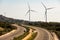 A pair of windmills in the Sierra del Merengue wind farm next to the Ruta de la Plata highway passing through Plasencia.