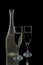 Pair of wine flutes and bottle