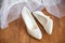 Pair of women formal high heel shoes stands on wooden floor parquet. morning gathering dressing bride accessories