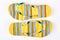 Pair of yellow striped flip flops.