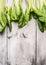 Pak choi on white wooden background, top view