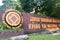 Pak Chong, Thailand - January 1, 2020 : National park sign of the Khao Yai National Park in east of Thailand. Brown wooden sign