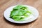 Pak Choy or Chinese Cabbage on white plate