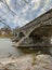 Pakenham Bridge, a five span stone bridge that crosses the Mississippi River on a cloudy autumn day in Pakenham, Canada