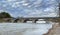 The Pakenham Bridge, a five span stone bridge that crosses the Mississippi River on a cloudy autumn day in Pakenham, Canada