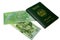 Pakistan commemorative new 75 rupees banknotes with a Pakistani green passport on a white isolated background
