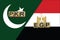 Pakistan and Egypt currencies codes on national flags background