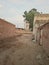 Pakistani  village street with water tank