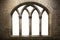Palace fancy window. Gothic arch stone medieval window. Brick, stone wall. Isolated transparent background.