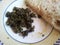 Palak Saag served in a ceramic plate on orange background