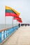 Palanga pier decorated with flags of Lithuania