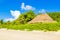 Palapa roof resort in tropical beach Playa del Carmen Mexico