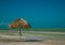 Palapa umbrella along a Caribbean beach on Isla Holbox Mexico