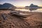 Palawan, Philippines. El Nido shore beach with local banca boat with picturesque sunset golden light scenery and island