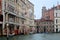 The Palazzo Giustinian and moored boat by the coloured mooring poles