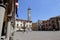 Palazzo PodestÃ  with clock tower at Plebiscito square in Viterbo, Italy