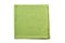 Pale green folded textile napkin on white