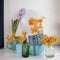 The Pale hyacint in blue cup and Blooming yellow Ornithogalum Dubium in a transparent bottle instead vase