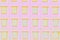 Pale pink wall and yellow orange windows pattern, abstract background