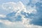 Pale white blue sky with scattered cumulus clouds, summer blue sky soft clear