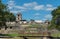 Palenque Ancient Ruins: Historical Architecture Amidst Breathtaking Sky and Tree Canopy